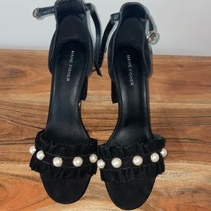 Gently worn black heels with pearls